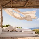 Lounge mit Meerblick und Pergola.webp